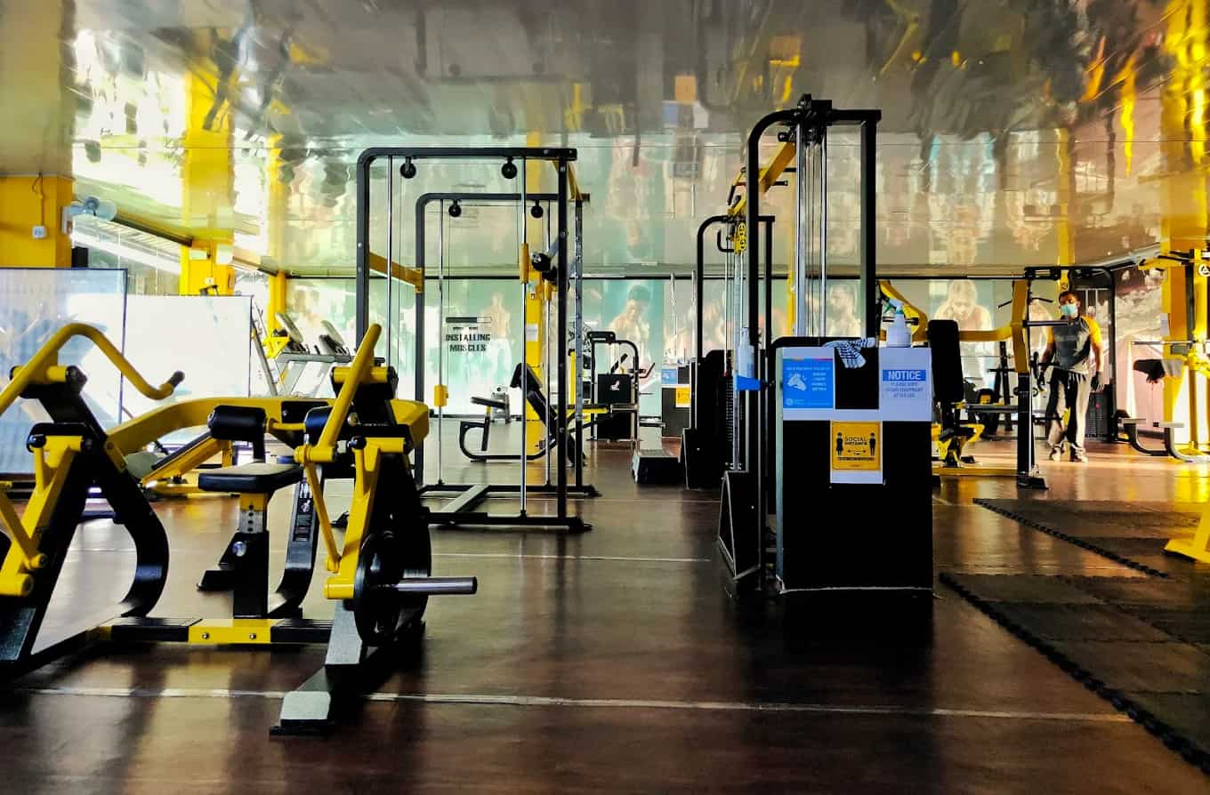 Modern cardio area with treadmills and bikes